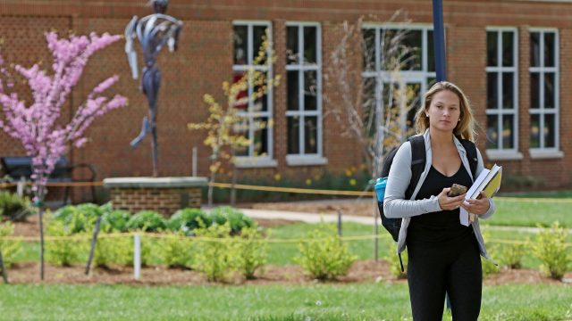 Female student walking on campus